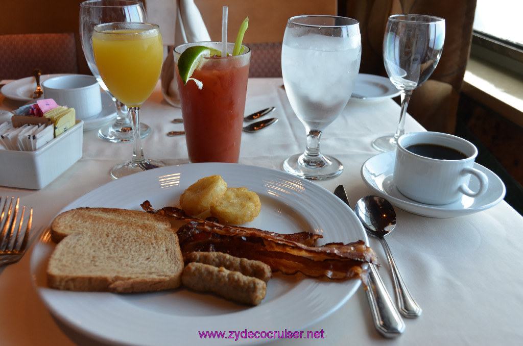 Carnival Elation, MDR Breakfast, Sea Day 2, Pineapple Juice, Double Bloody Mary, Coffee, Bacon, Sausage, Hash Browns, Wheat Toast. 