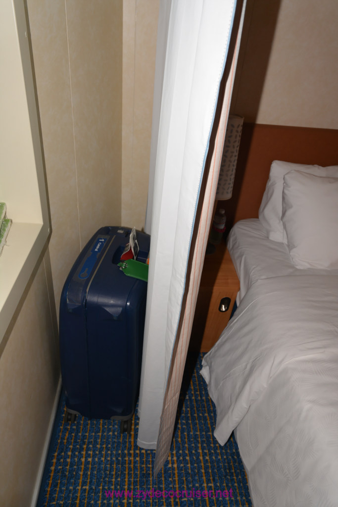 030: Carnival Panorama Inaugural Cruise, Sea Day, Some storage behind curtain in port hole cabin
