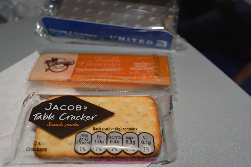 004: Carnival Vista, Pre-cruise, United Cattle Class Plus, IAH-Munich, Airline cheese and crackers